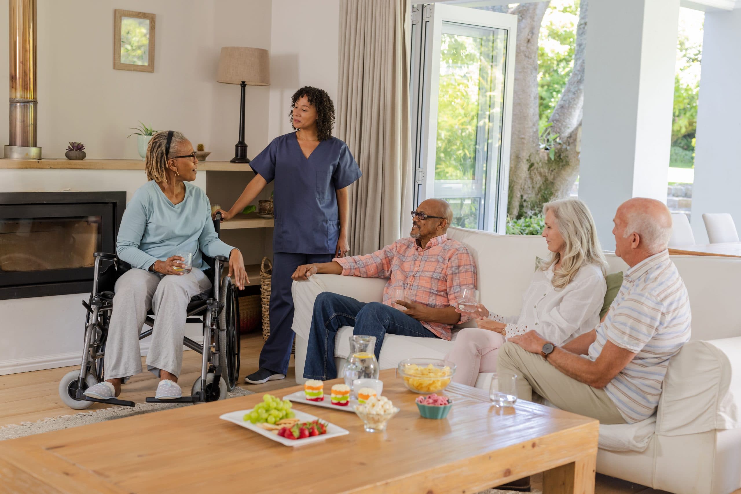 Care team sharing a conversation with senior residents